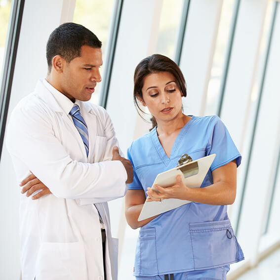 medical assistant working with doctor