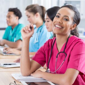 nursing students in class taking notes