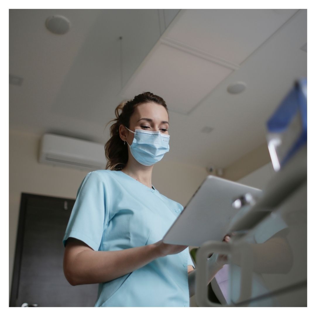nurse reviewing chart